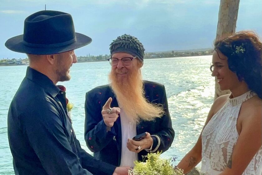 Before headlining Sept. 10 blues festival, Grammy-winning Billy F. Gibbons weds San Diego singers Tim Lowman and Dani Bell.
