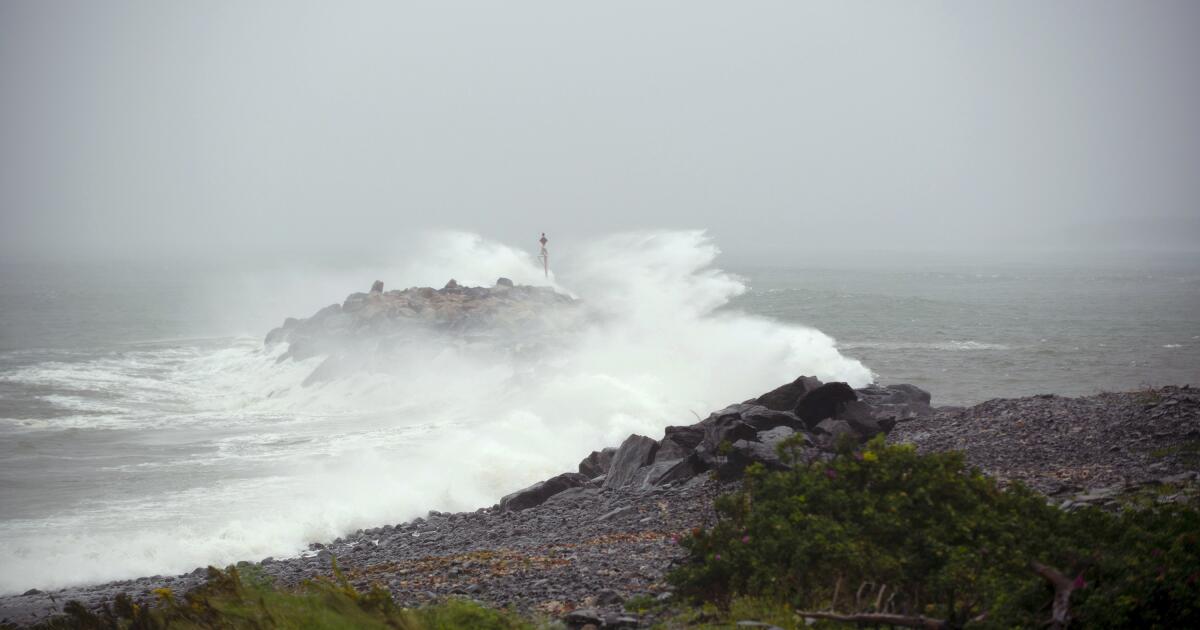Storm Lee leaves one dead and thousands without power as it reaches New England and Canada