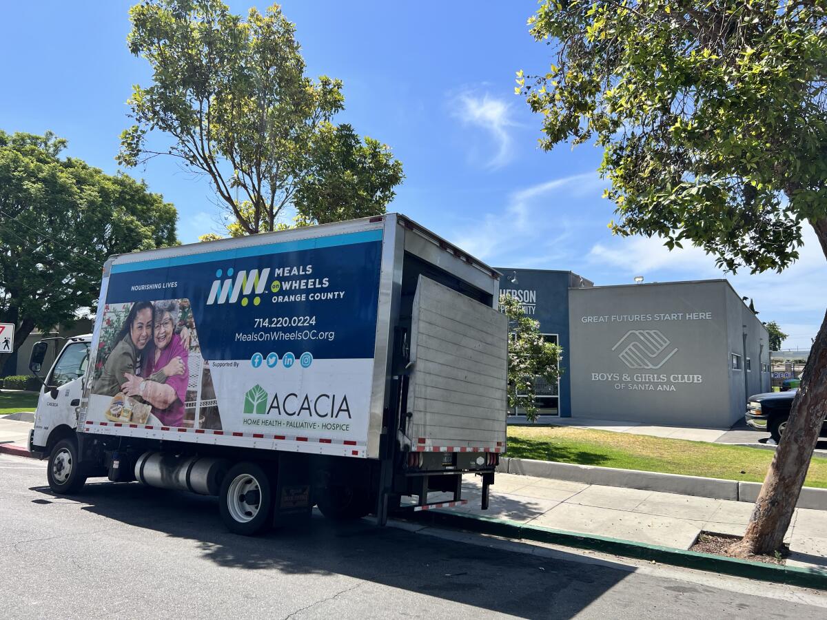 A Meals on Wheels truck delivers food at Boys & Girls Club of Santa Ana.