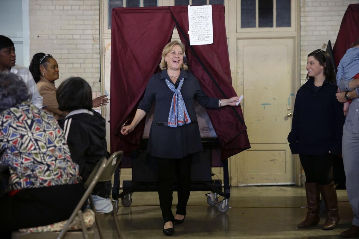 U.S. Sen. Mary Landrieu of Louisiana leaves the booth after voting Tuesday.