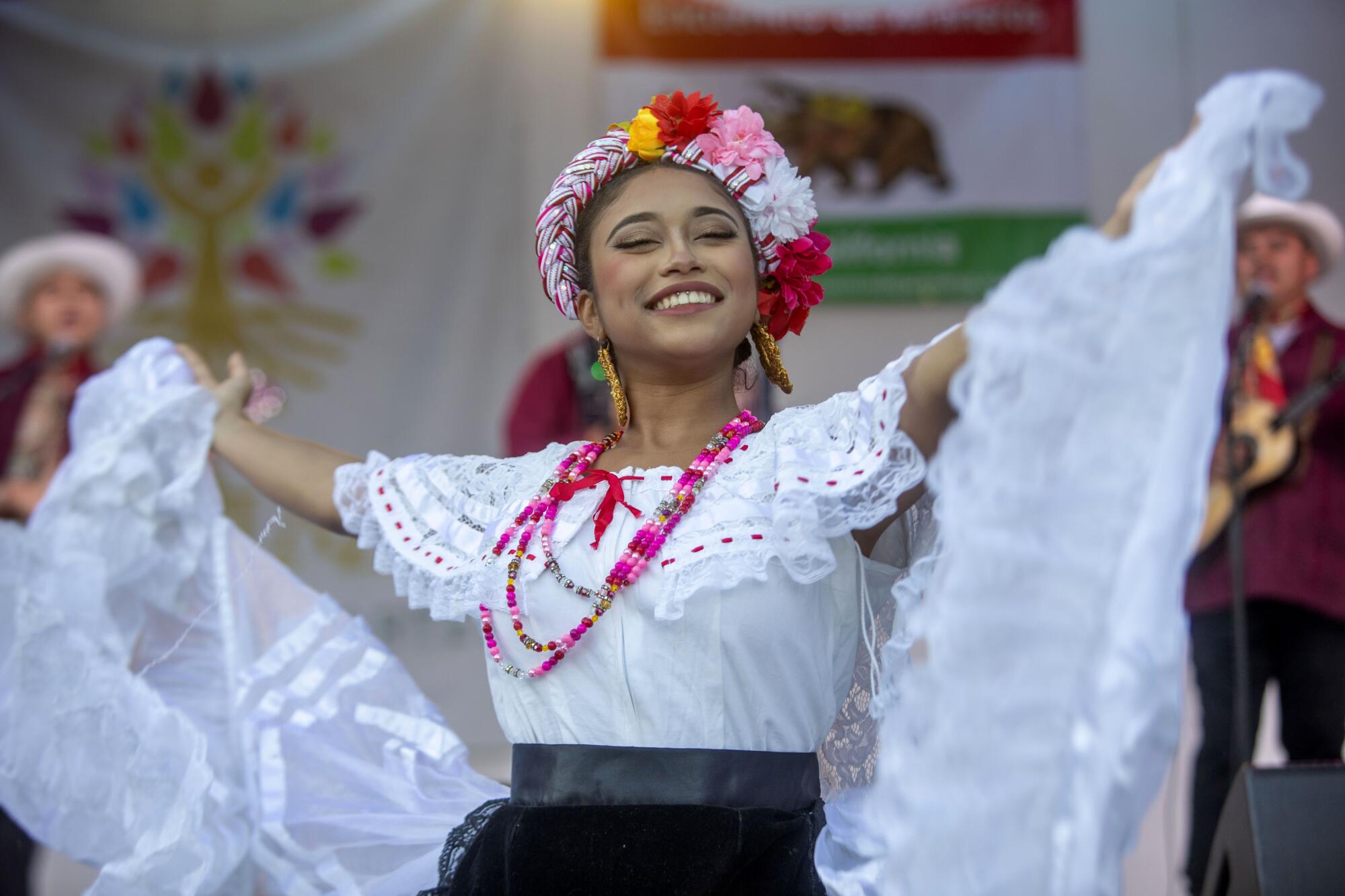 Mariah Ruiz of Xochipitxahuatl folklorico group dances during the 21st Annual Encuentro De Jaraneros De California