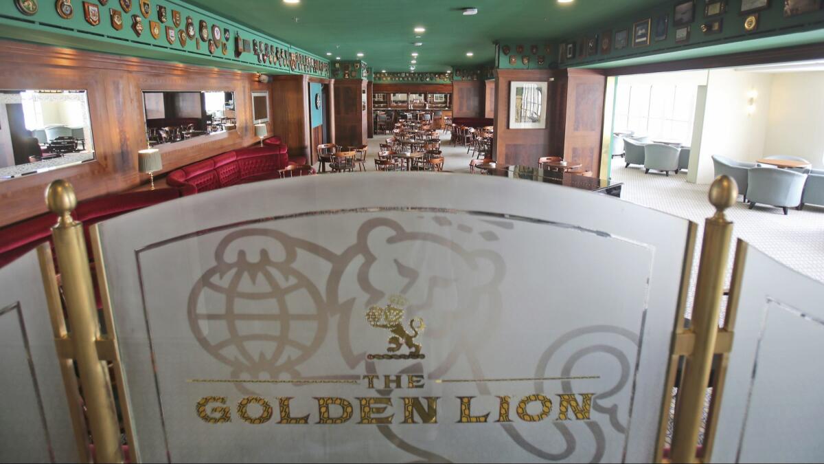 The refurbished bar is ready to receive guests aboard the Queen Elizabeth 2, moored off Dubai, United Arab Emirates.