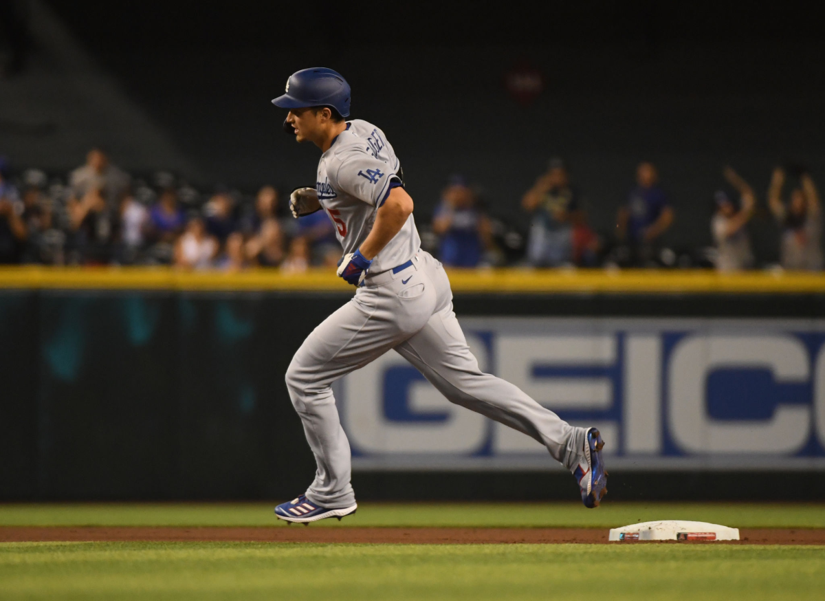 Dodgers shortstop Corey Seager rounds the bases after hitting the first of his two home runs Sunday.