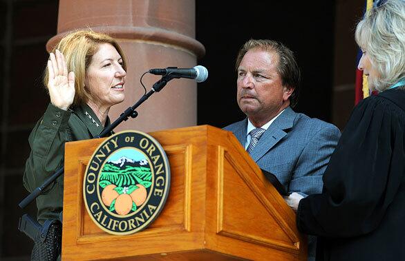 Sandra Hutchens is sworn in as the Orange County's new sheriff on the court steps of the Old County Courthouse Tuesday.