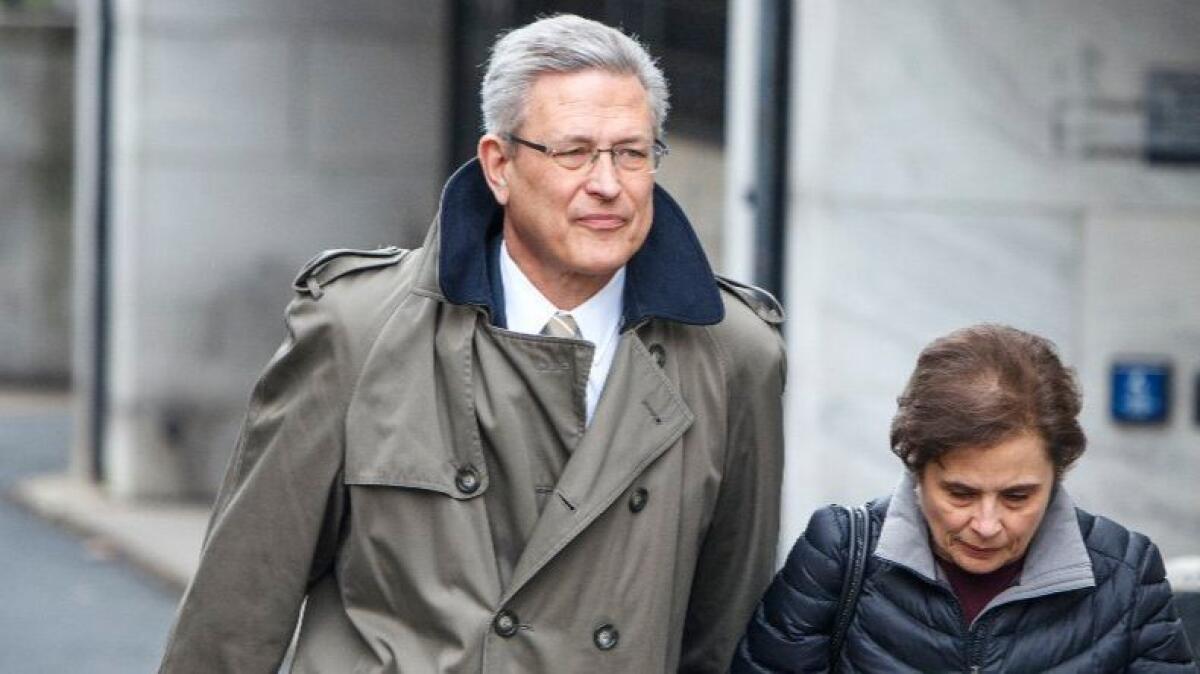 Former Penn State Athletic Director Tim Curley leaves the Dauphin County Courthouse in Harrisburg, Pa. on Mar. 13 after pleading guilty to endangering the welfare of a child in the Jerry Sandusky child molestation case.