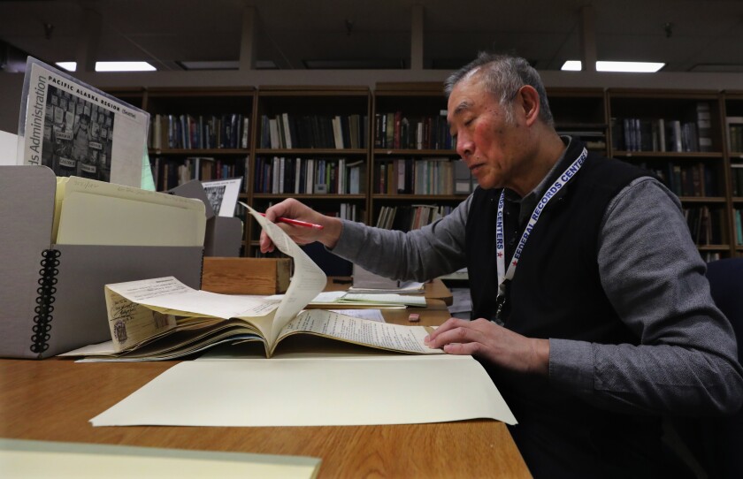 Hao-Jan Chang conducts research earlier this year in the National Archives at Seattle.