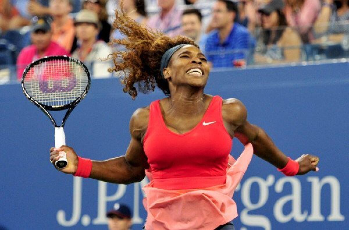 Serena Williams celebrates after defeating Victoria Azarenka for her 17th victory at a Grand Slam singles tournament.
