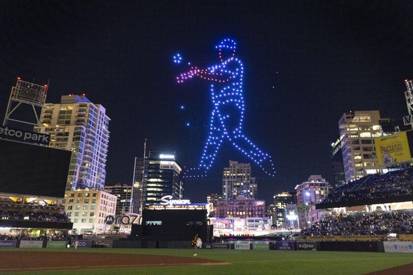 San Diego CA - April 1: A drone light show was held after the San Diego Padres played the St. Louis Cardinals to celebrate the 20th Anniversary of Petco Park on Monday, April 1, 2024. Here, Tony Gwynn is depicted. (K.C. Alfred / The San Diego Union-Tribune)