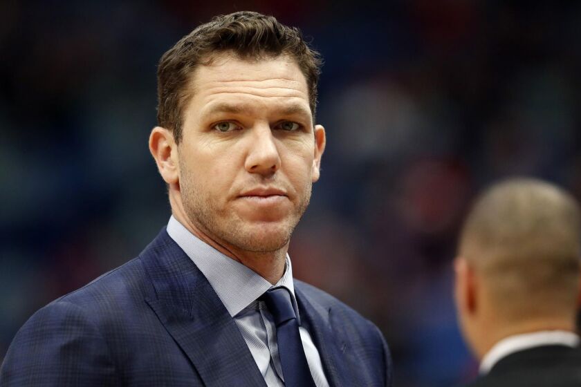 Los Angeles Lakers head coach Luke Walton during the first half of an NBA basketball game in New Orleans, Sunday, March 31, 2019. (AP Photo/Tyler Kaufman)