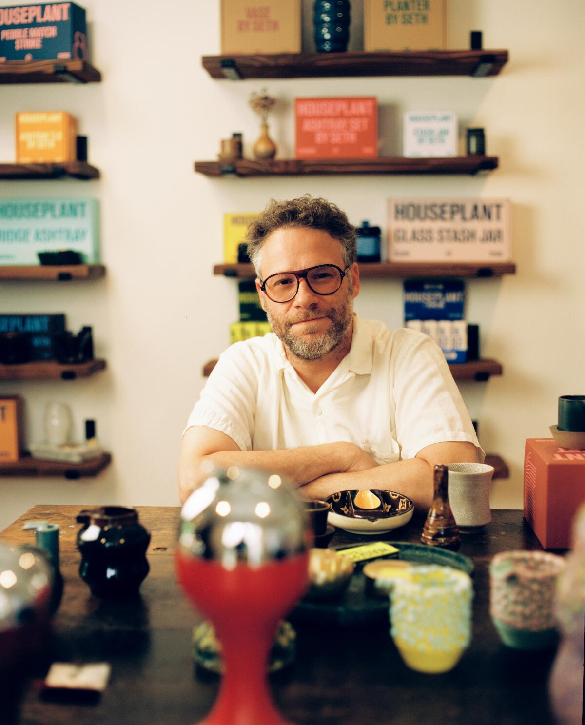 Seth Rogen and some favorite ashtrays from his extensive collection.