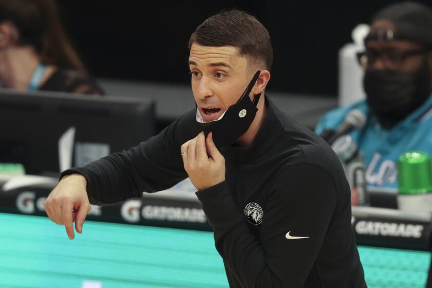 Minnesota Timberwolves coach Ryan Saunders directs his team against the Charlotte Hornets.