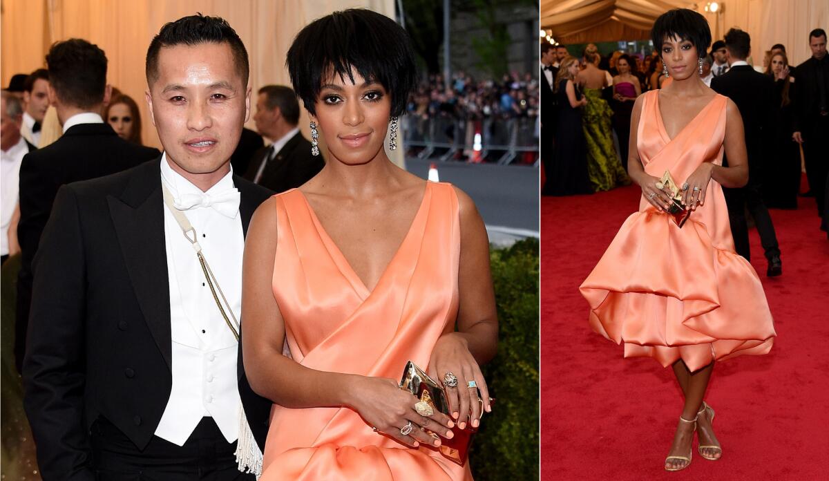 Solange Knowles poses on the red carpet last week with designer Philip Lim, whose creation she wore to the Metropolitan Museum of Art's Costume Institute Gala. Surveillance video came out Monday showing her later that night in a physical altercation with brother-in-law Jay Z.