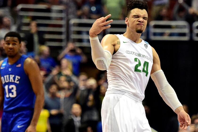 Oregon guard Dillon Brooks reacts after making a three-point shot against Duke on Thursday night.
