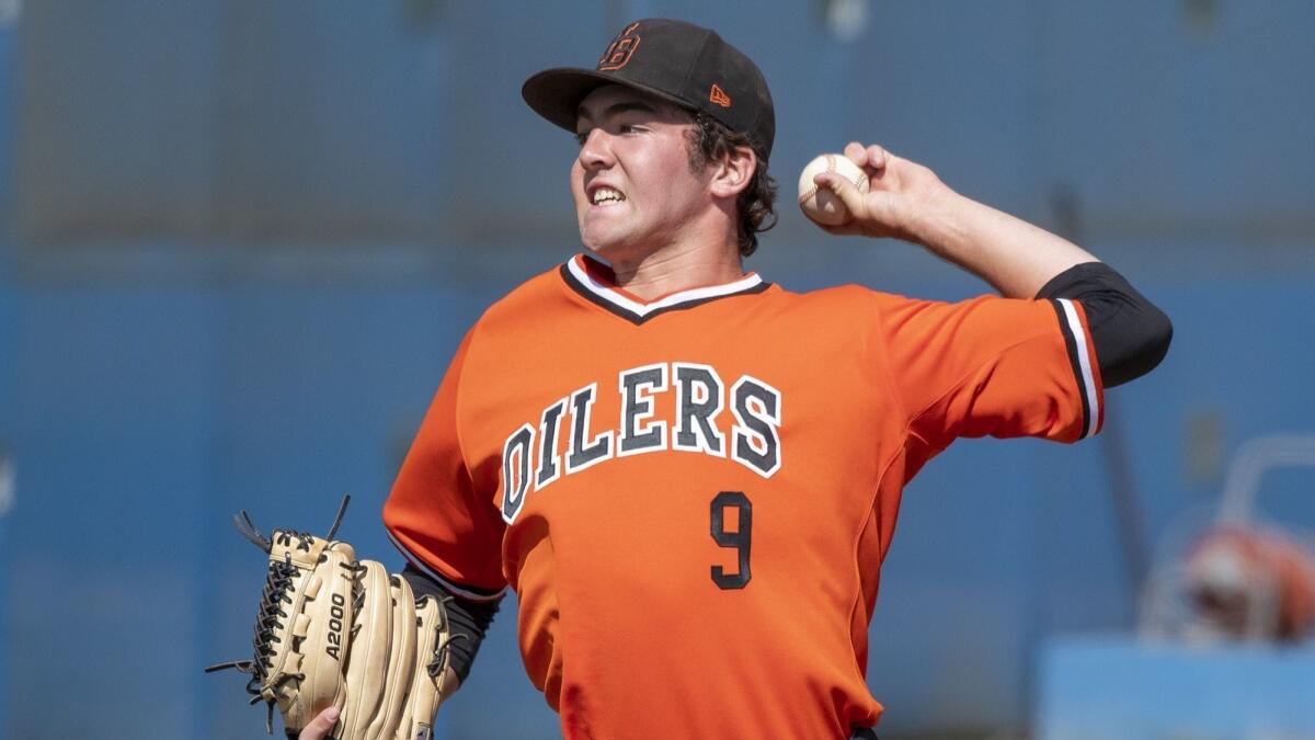 Huntington Beach High's Josh Hahn, pictured throwing against Fountain Valley on April 27, finished 3-1 with two saves and a 1.88 earned-run average, striking out 41 batters and walking 13 in 37 1/3 innings.