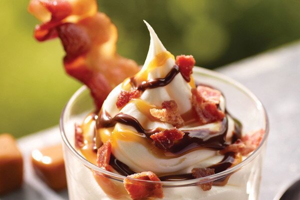 Yes, that's bacon on that ice cream. Burger King, the world's second-biggest burger chain, introduced the bacon sundae as part of its summer menu. More on Burger King's effort to win over your taste buds: Get that with a side of sweet potato fries.