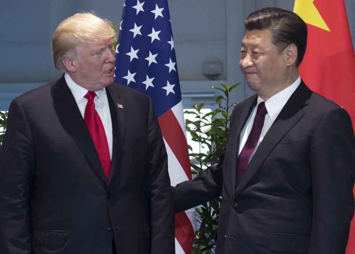 President Donald Trump and China's President Xi Jinping in July.