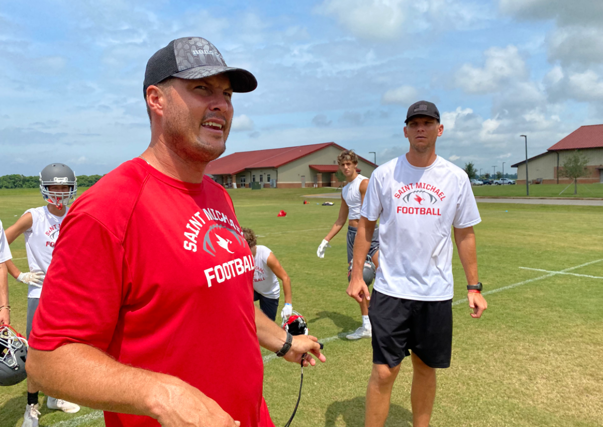Retired NFL quarterback Philip Rivers and younger brother Stephen are coaches at St. Michael Catholic High in Fairhope, Ala.