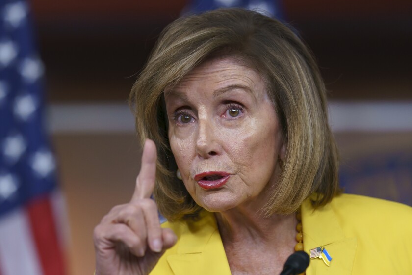 When speaking, Nancy Pelosi raises her index finger.