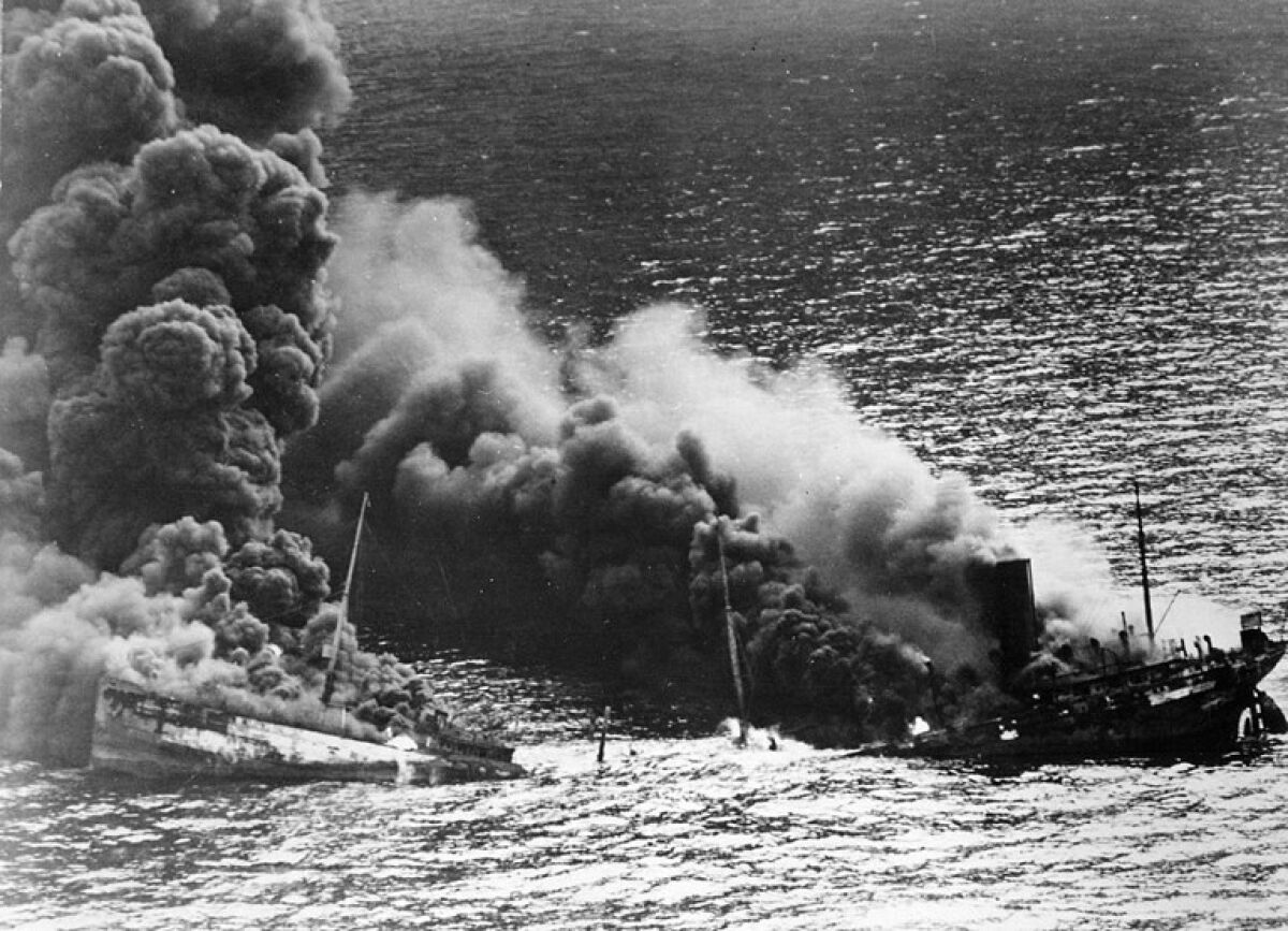 The Normandie goes down in flames on Feb. 9, 1942, in New York. 