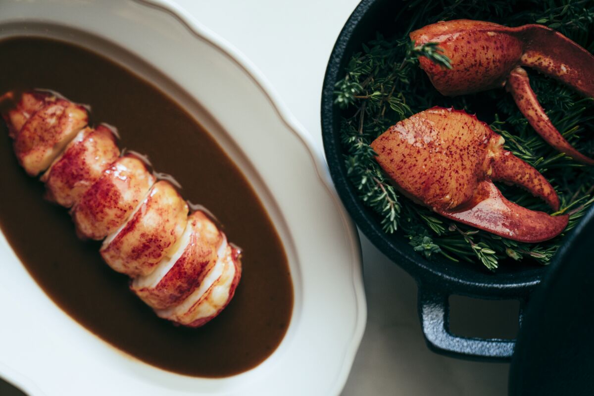 Lobster with coral bisque and lobster claws.