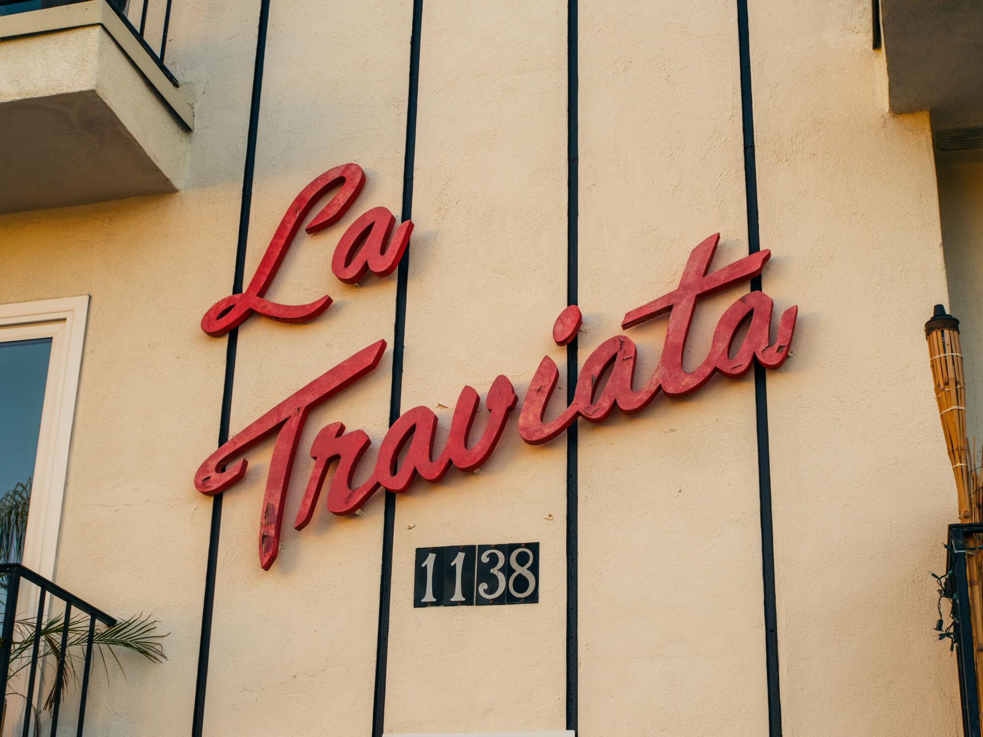 Apartment building sign that reads “La Traviata 1138”