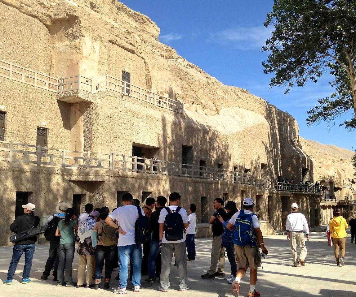 The Mogao Grottoes are bracing for up to 1 million visitors this year. When they first opened to the public in 1979, they received 26,000 visitors.
