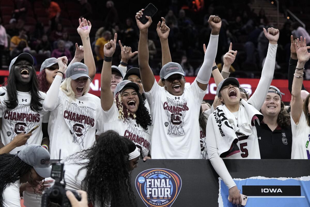 South Carolina players celebrate after the Final Four college basketball championship game.