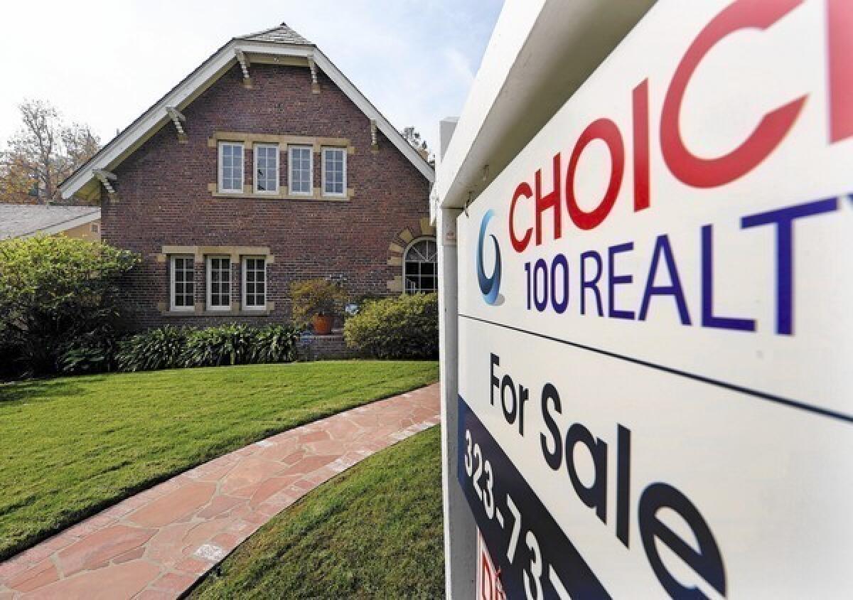 Mortgage interest rates fell this week, according to Freddie Mac, which said lenders were offering the 30-year fixed home loan at 4.41% on average. Above, a home on the market in Los Angeles.