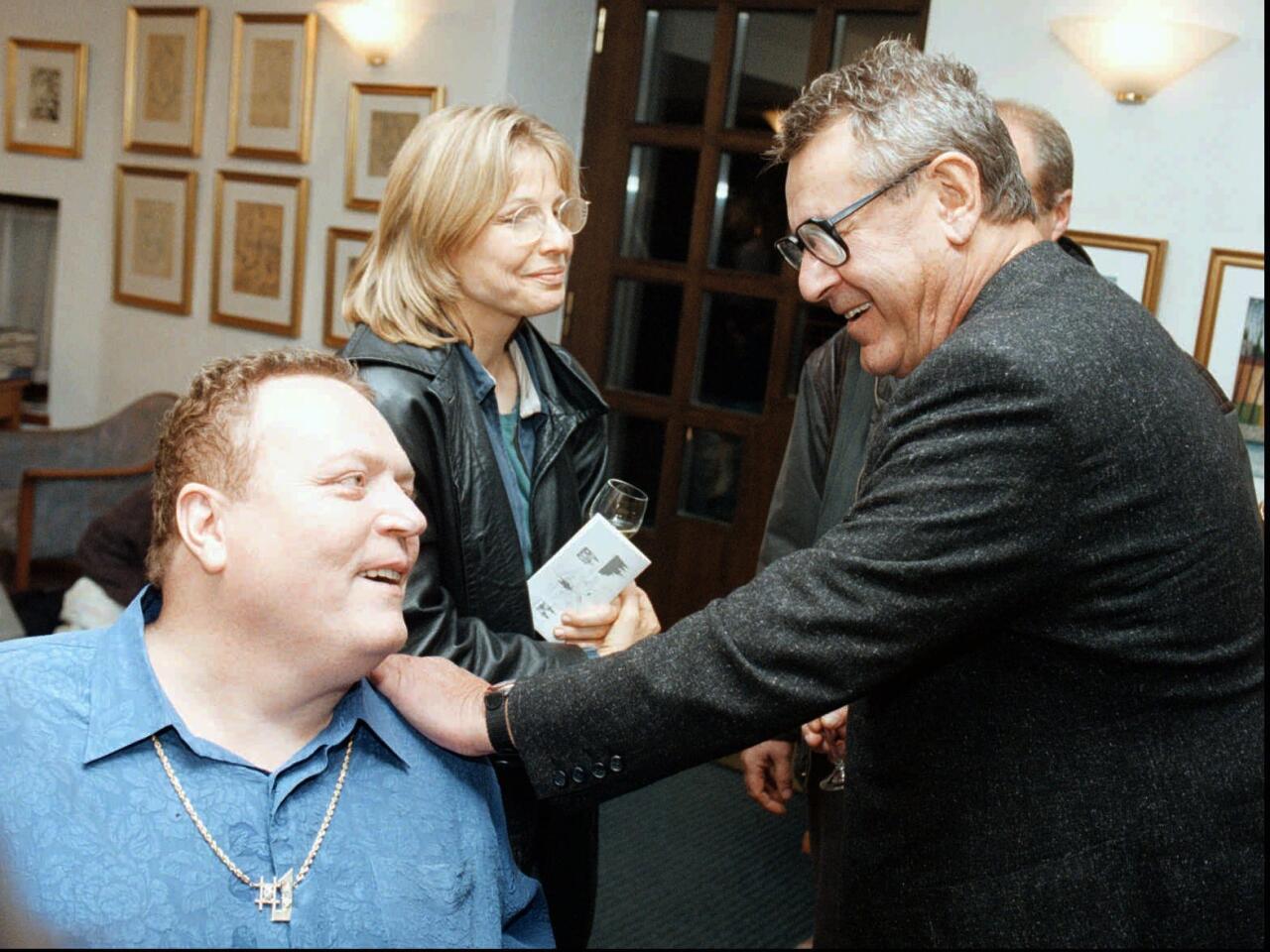 Milos Forman, right, with publisher Larry Flynt as they arrive at Hoffmeister Hotel in Prague, Czech Republic, in October 1996. Forman was in Prague to present "The People vs. Larry Flynt."