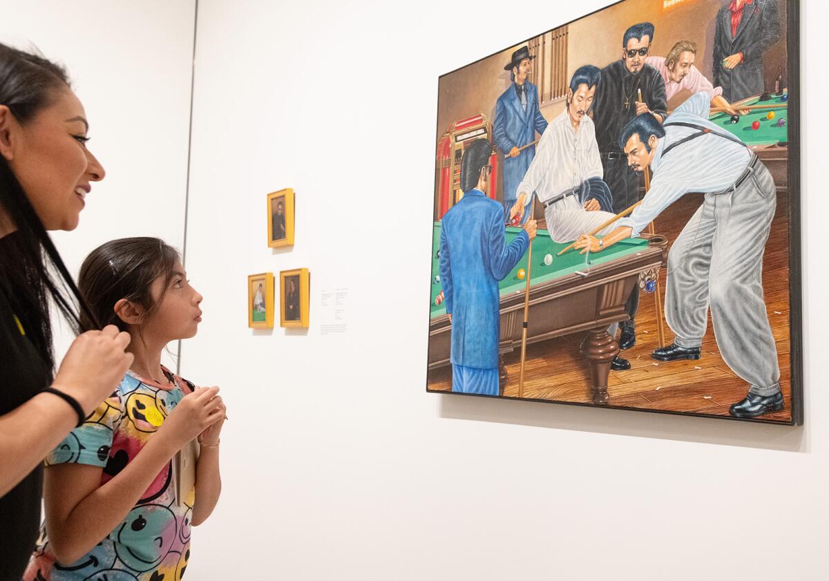 Ana Tavares and her daughter, Tahlia, visit the Hilbert Museum of California Art in Orange.