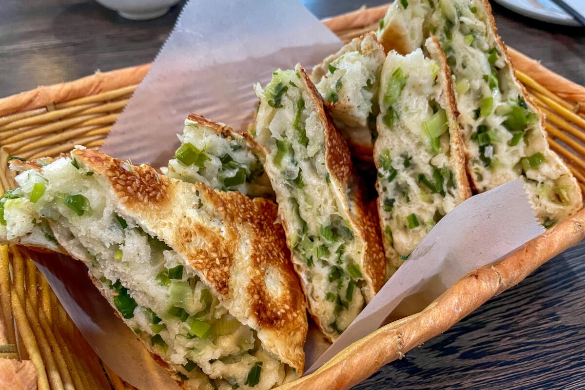 Triangles of the signature green onion sesame pie from Ahgoo's Kitchen in Temple City.