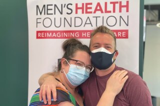 All Californians 16 and over can now get COVID-19 vaccine.
Here's how 3 Chad Concelmo, left, with his friend just minutes after their first post-vaccination hug on April 10.
