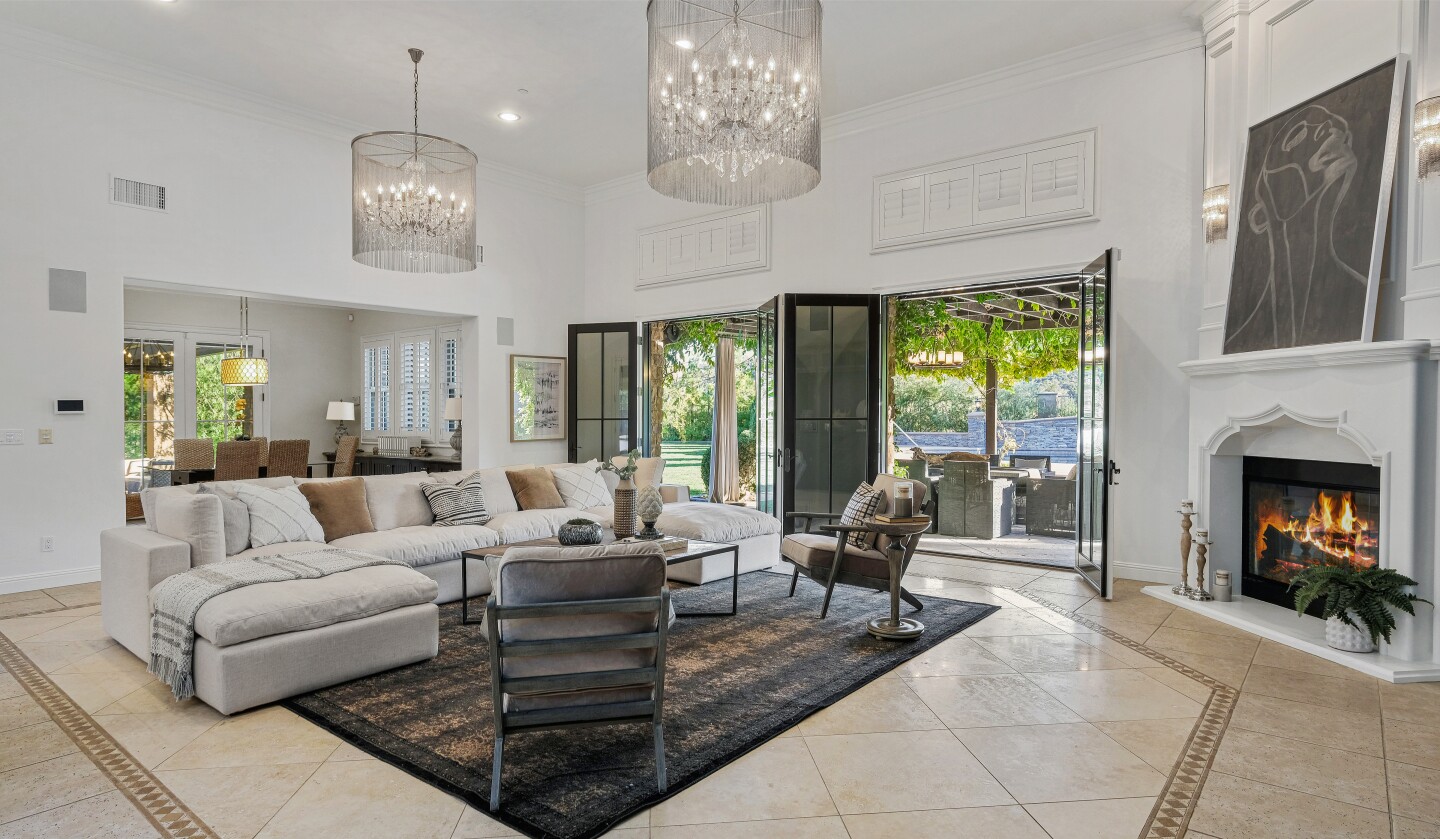 The Tuscan-style retreat includes five bedrooms, six bathrooms, a double-height dining room and a professional recording studio.