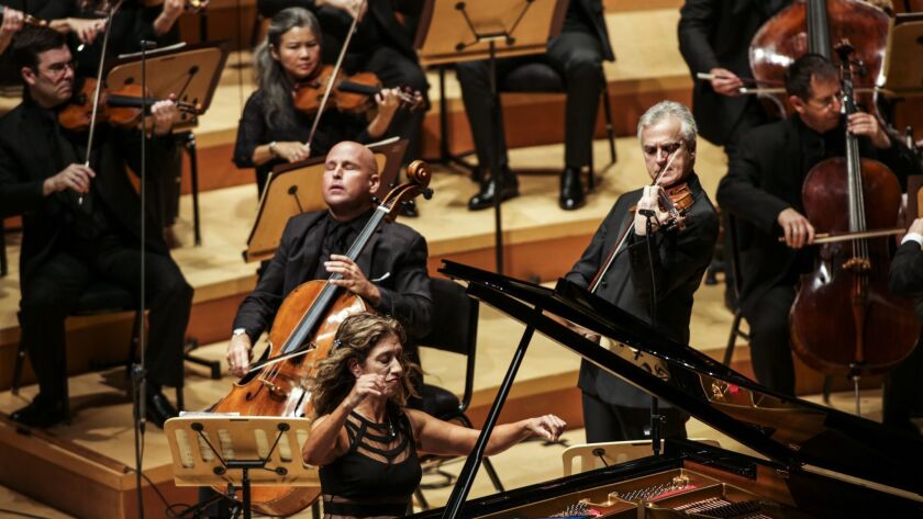 Los Angeles Philharmonic principals, from left, Robert deMaine, cello, Joanne Pearce Martin, piano, and Martin Chalifour, violin, as soloists in Beethoven's Triple Concerto at Walt Disney Concert Hall Thursday night with Gustavo Dudamel conducting.