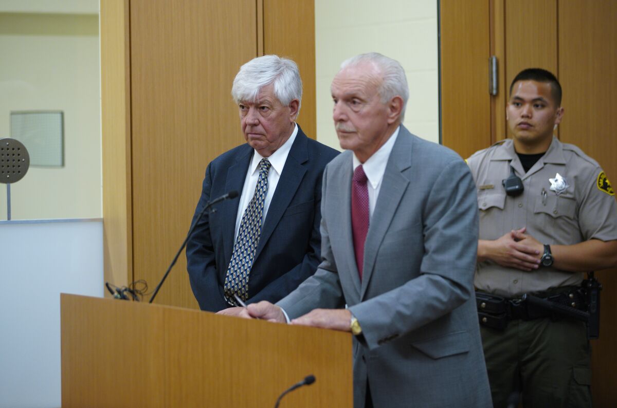 Robert Williams and his lawyer stand at a lectern in San Diego Superior Court