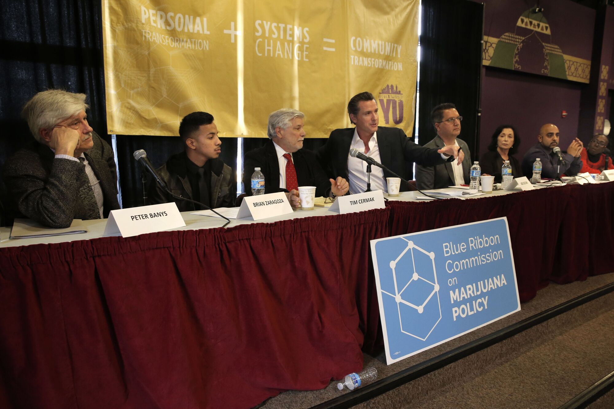 California Lt. Gov. Gavin Newsom (center) makes remarks during a public forum