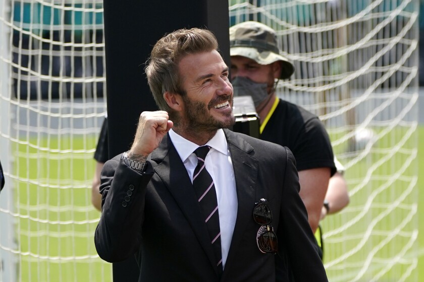 Inter Miami's David Beckham waves to fans.