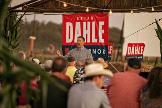 ANDERSON, CA - SEPTEMBER 30: Brian Dahle (R-Bieber), who is running against Gov. Newsom for governor talks with a crowd of supporters at Historic Hawes Farms where they are unveiling a corn maze that features the face of Dahle on Friday, Sept. 30, 2022 in Anderson, CA. (Jason Armond / Los Angeles Times)