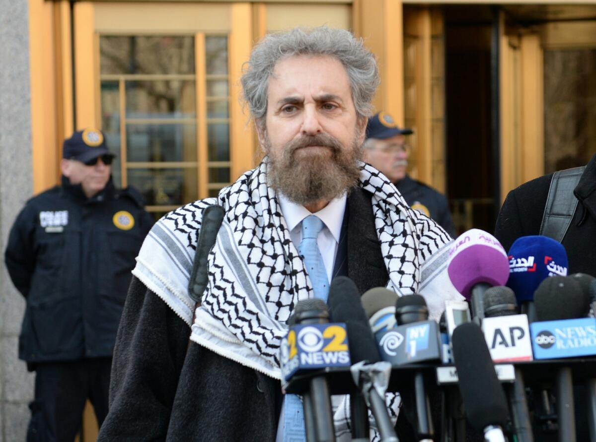 Defense attorney Stanley Cohen, attorney for Sulaiman abu Ghaith, answers questions from reporters outside Manhattan Federal Court on Wednesday.