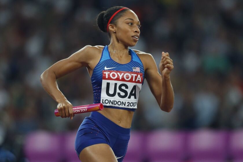 United States' Allyson Felix competes in the women's 4x400-meter final during the World Athletics Championships in London Sunday, Aug. 13, 2017. (AP Photo/Kirsty Wigglesworth)