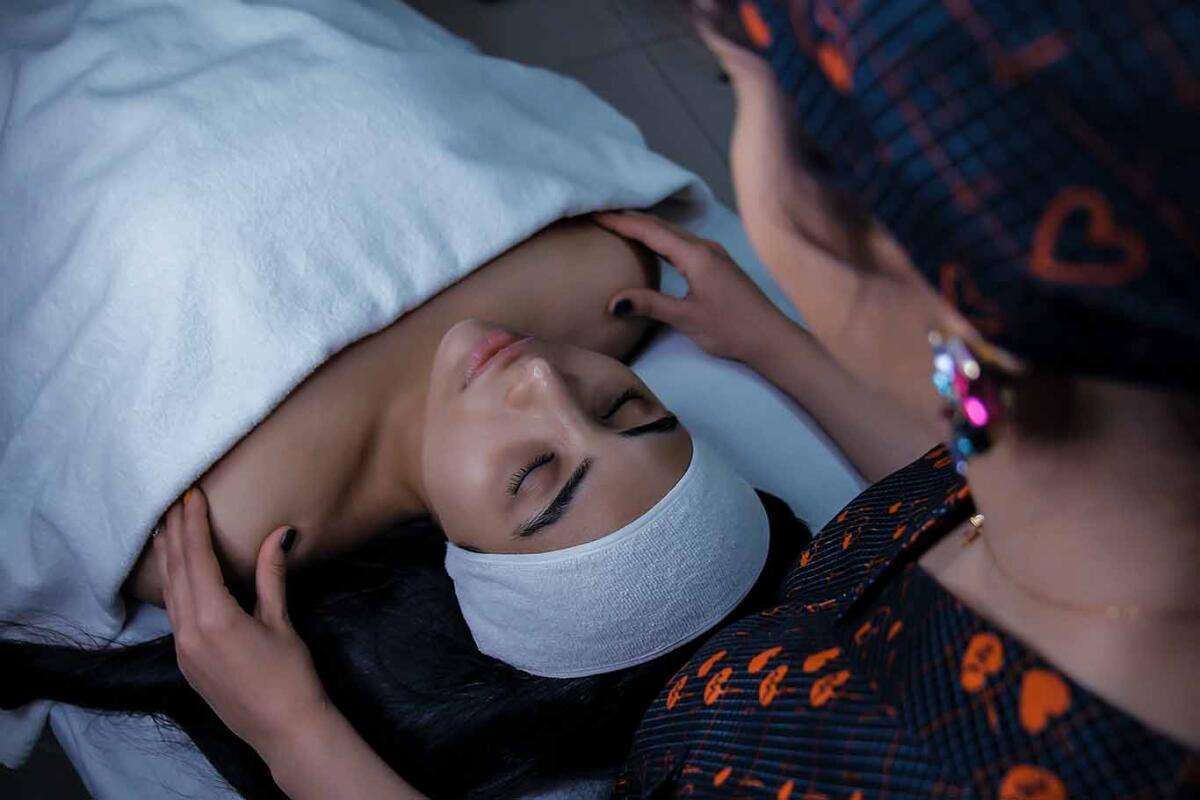 A woman receives a hydrofacial.
