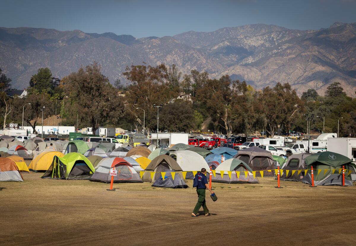 Rows of tents in the Rose Bowl parking lot.
