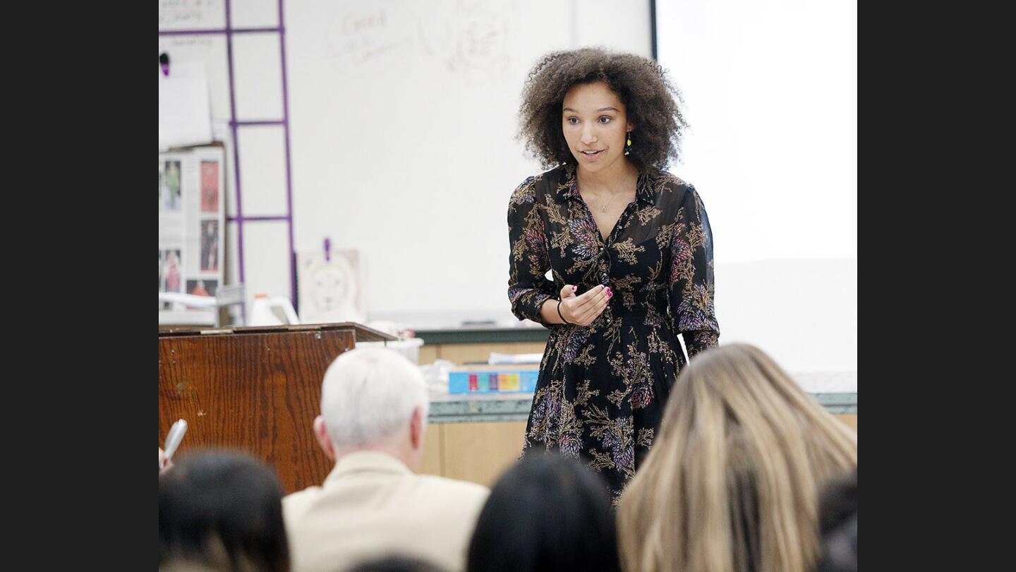 8th grade student Madison Clevenger delivers a final-round speech called "My Body is Mine" as part of the 12th annual speech contest at John Muir Middle School on Thursday, March 15, 2018.