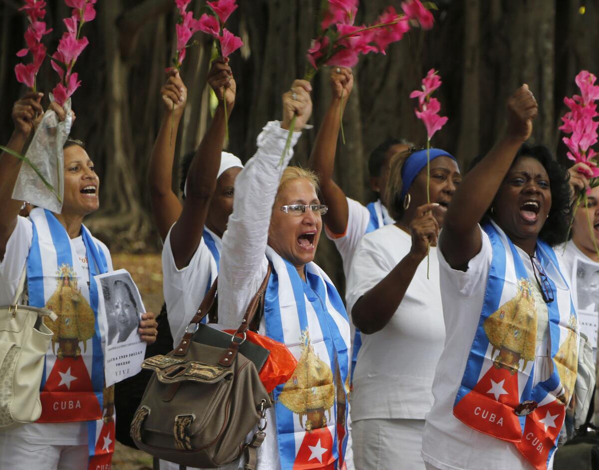 Members of the Cuban dissident group Ladies in White at their weekly demonstration in Havana on Dec. 28. The Dec. 17 announcement of plans to normalize U.S.-Cuba ties has divided rights activists in both countries.