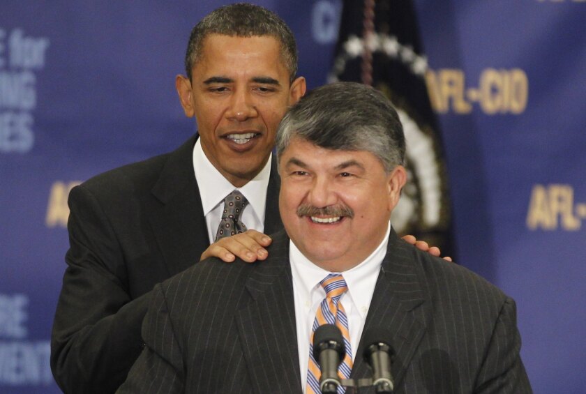 AFL–CIO President Richard Trumka, front, who praised Thursday's pro-labor NLRB ruling, introduces President Obama at the union's winter meeting in 2012.