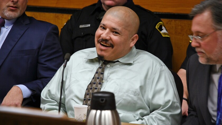 Luis Bracamontes acts out in court during day one of his trial in Sacramento, Calif., Superior Court. Bracamontes, a man in the U.S. illegally, was convicted Friday, Feb. 9, 2018 of killing two Northern California deputies.