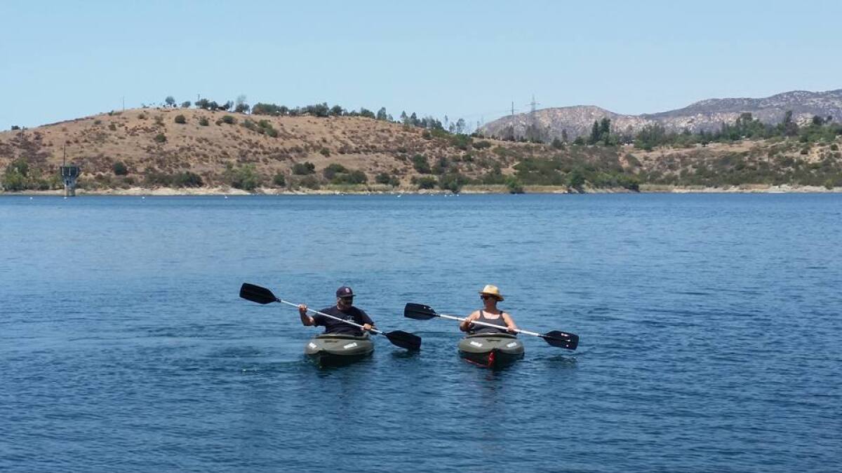 Kayakers enjoy time on the water at Lake Jennings.