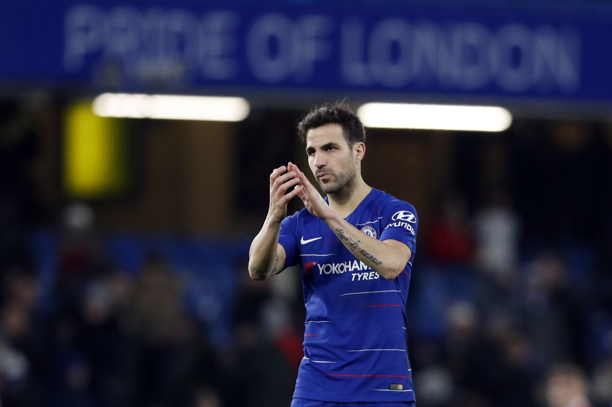 FILE - Chelsea's Cesc Fabregas applauds the supporters at the end of the English FA Cup third round soccer match between Chelsea and Nottingham Forest at Stamford Bridge in London, Jan. 5, 2019. Former world and European champion Fabregas has joined Italian second-division club Como. Fabregas, who won the World Cup with Spain in 2010 as well as two European Championships, was unveiled as a Como player on Monday, Aug. 1, 2022, after signing a two-year contract. (AP Photo/Alastair Grant, File)