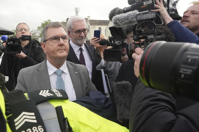 Former DUP leader Sir Jeffrey Donaldson arrives at Newry Magistrates' Court, where he is charged with several historical sexual offences, in Newry, Northern Ireland, Wednesday April 24, 2024. Sir Jeffrey resigned as DUP leader and was suspended from the party following the charges. (Niall Carson/PA via AP)