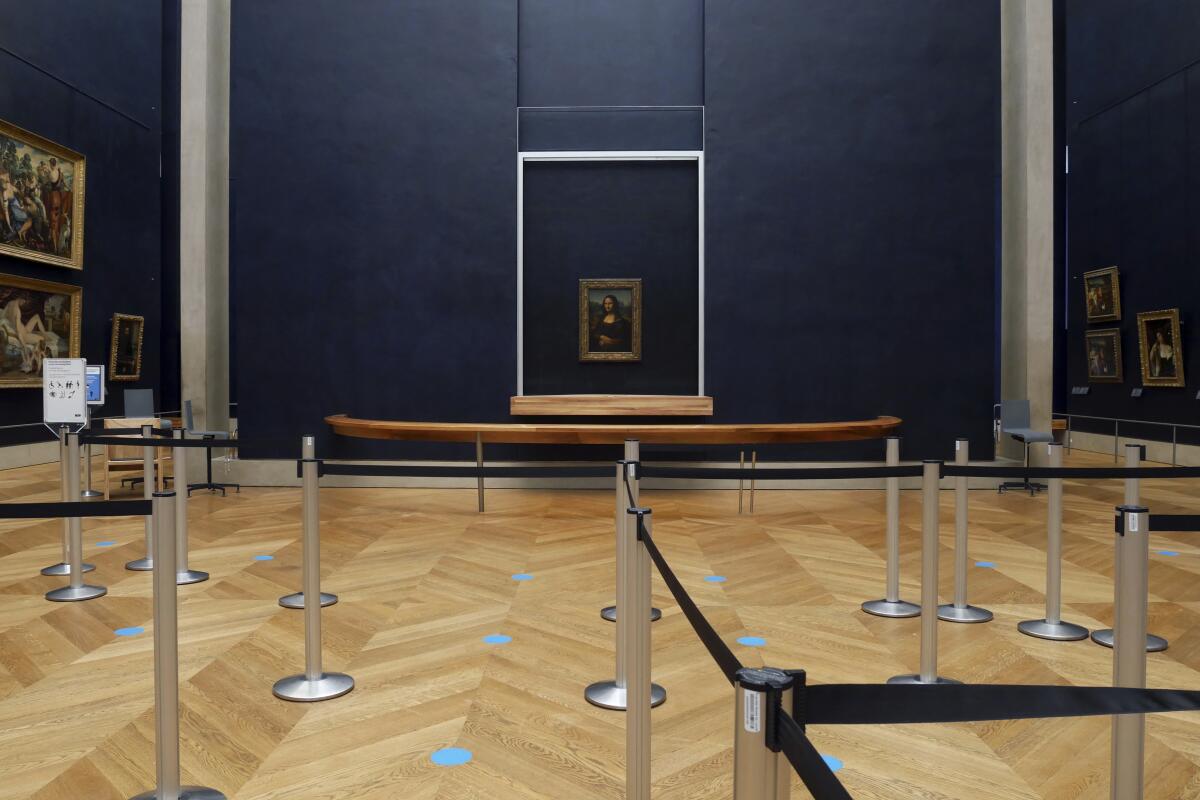 Leonardo da Vinci's Mona Lisa hangs in a deserted museum